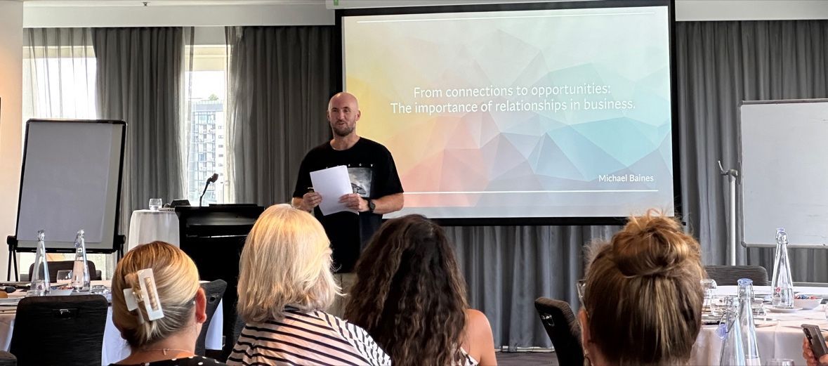 Mick Baines presenting to an audience