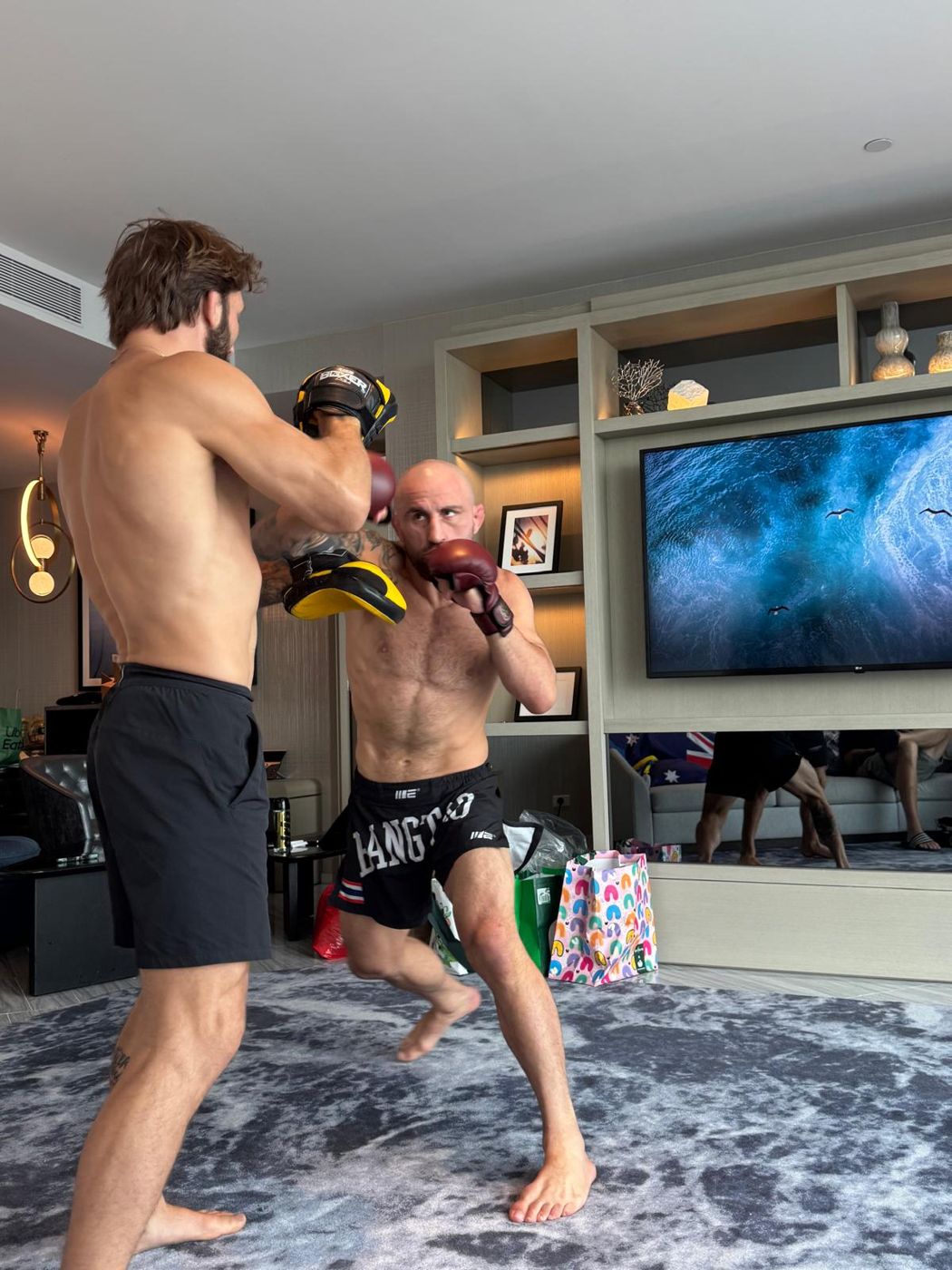 Pad work in the suite.