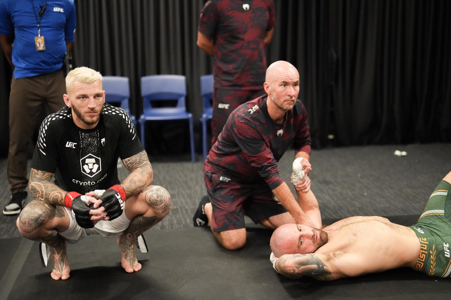 Backstage physiotherapy and treatment during UFC 325 fight week.