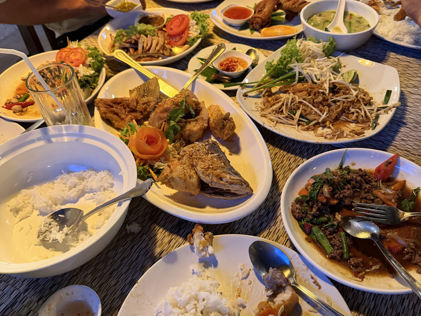 A table covered in shared dishes